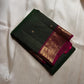Hemavalli Zari Kattam: Stunning Emerald Green & Rani Pink Korvai Pure Silk Kanchipuram with Gold Zari Checks
Silk Mark Certified for Quality Assurance, Enjoy Free Shipping within USA.
Ready to Ship in 2 Weeks with Majestic Peacock Borders.