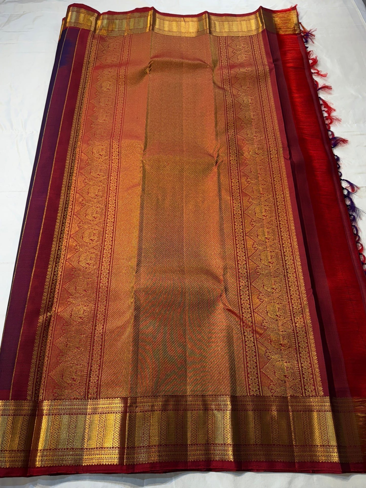 Sindhu – Royal Purple Kanchipuram Pure Silk Saree with Gold Zari Floral Buttas, Crimson Rettapet Border & Ornate Pallu