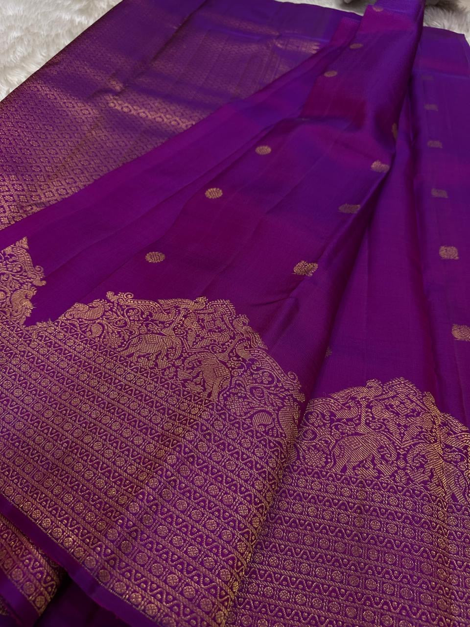 Svaroopam Vibrant Purple
Magenta-Purple Kanchipuram Silk Saree
Fine Zari Buttas & Ornate Heritage Border