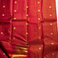 Nakshatra – Radiant Red Vairaoosi Kanchipuram Silk Saree Adorned with Mayil & Chakram Zari Buttas, Featuring an Ornate Kamalam and Floral Vine Zari Border, Flanked by Varisaipet Motifs, and a Pallu Woven with Sacred Thulasi Madams and Regal Kamalams