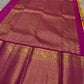 Crafted from pure Kanchipuram silk, this golden yellow saree features a broad pink border with traditional Yali motifs. The pallu is richly woven with bold elephant designs in thick zari—an elegant blend of heritage and grandeur.