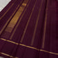 Ilam  Vadamalli Chakram — Kanchipuram Pure Silk

Pastel lilac–mauve body with gold & silver chakram buttas

Deep plum contrast border with twin kaddi zari lines

Plum pallu with elegant vertical zari stripes; lilac tassels

Silk Mark Certified •