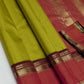 Poornima — Pure Kanchipuram Silk Saree (Lime Green × Sindhoor Red)
Elegant haritha-lime body with subtle self-checks and rich sindhoor-red korvai borders in pure zari weave
Silk Mark Certified • Fall & Pico Done • Blouse Stitching Available ($30) • Free S