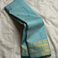 Aakash Butta — Pure Silk Kanchipuram Saree
Ice Aqua Blue with Gold Coin & Paisley Zari Buttas | Teal Edge Border
Silk Mark Certified ✅ • Fall & Pico Done ✅ • Blouse Stitching ($30) ✅ • Ships in Two Weeks • Free Shipping within USA 🇺🇸