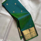 Dia ✨ – Vibrant Peacock Green Kanchipuram Pure Silk Saree
Gold Zari Buttas Adorning the Body
Intricate Gaja–Annam (Elephant & Peacock) Motif Border
Coordinated Peacock Green Silk Blouse Piece Included
Silk Mark Certified | Fall & Pico Done | Ready to Ship