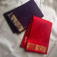 Mahima –red
A luminous red pure silk Kanchipuram drape adorned with delicate baby  kamalam buttas. The petite border features muthu seer and zari-woven elephants with floral vines. Its grand pallu showcases annams, golden grids, and Rudhraksham seer.