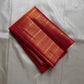 Orange red shot  Zari kattam with ornate border pure silk Kanchipuram with mayil chakram zari butta and detailed Pallu