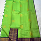 Arangetram — Parrot-Green Kanchipuram Pure Silk
Royal Purple Korvai Border 

Elephant Procession Panels & Coin Buttas

Rich Brocade Pallu • Blouse Included

Silk Mark Certified • Free USA Shipping • Ships in Two Weeks