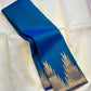 Neelam ettukol 
Pure Kanchipuram Silk Saree – Deep Ocean Blue with Silver Zari Ikat Motifs
Rich 8 Kol Weave for Heavier, Denser & Lustrous Drape
Silver Tissue Pallu with Intricate Brocade Weaving
Includes Matching Blue Blouse Piece with Zari Border