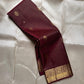 Zari Kattam Araimaadam – Coffee Brown, Pure Kanchipuram Silk Saree
Coffee-brown body with zari kattam checks, floral & mango buttas
Grand antique-gold border with floral/peacock vine;
Silk Mark Certified | Blouse Piece Included |ships in 1 week