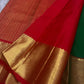 Gold zari pallu detail with rich zari-woven texture and red edging on Kanchipuram silk saree