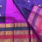 Peacock Purple Rajam – Pure Silk Kanchipuram Saree
Deep Peacock Purple Body with Gold Zari Buttas
Korvai Borders with Temple, Peacock & Elephant Motifs
Rich Zari Pallu with Vertical Brocade Stripes
Silk Mark Certified | ships in two week| Blouse Stitching