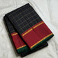 Deep red Kanchipuram pallu with gold zari banding — full spread