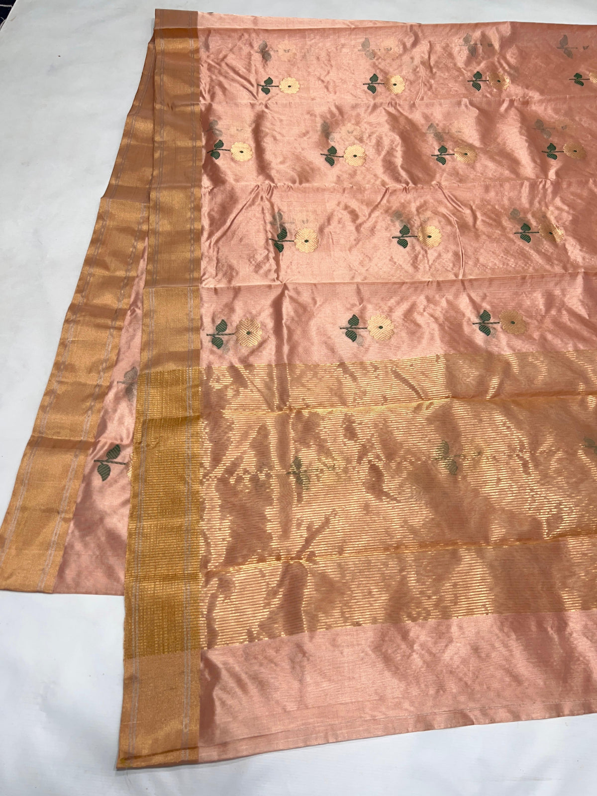 Full length view of Blush Peach Pattu Silk Chanderi saree with floral buttas