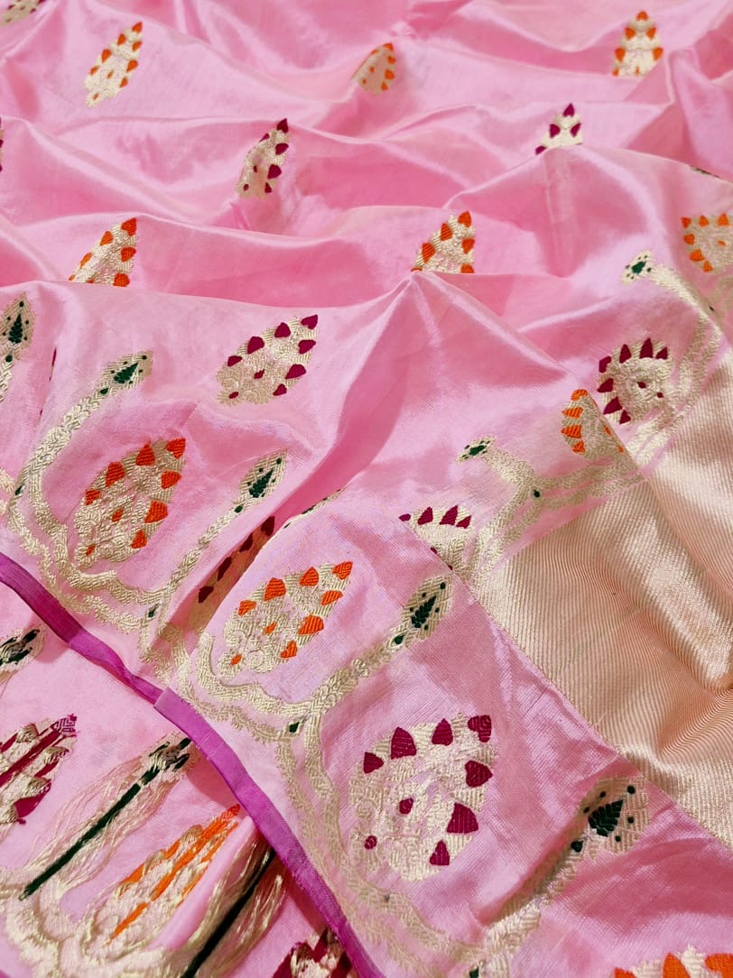 Draped blush pink handloom Chanderi silk saree with intricate multicolour woven border and metallic pallu