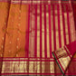 Crimson pallu with grand gold zari Yazhi motif composition on Kanjivaram saree