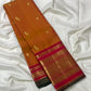 Burnt orange and crimson handwoven pure silk Korvai Kanchipuram saree with Yazhi motif overview