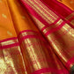 Korvai interlocked border join between burnt orange body and crimson border