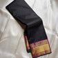 Charcoal Zari Kattam – Pure Kanchipuram Silk Saree
Rich Charcoal Black Body with Gold Zari Checks
Broad Golden Border with Magenta Highlights & Green Selvedge
Royal Magenta Pallu with Lustrous Zari Stripes

Silk Mark Certified, delivery in 2 weeks
