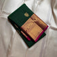 Maragatha Mayil Butta — Kanchipuram Pure Silk

Emerald green (maragatham) body with gold mayil/peacock buttas

Contrast rani-magenta korvai borders & zari-rich pallu

Silk Mark Certified | Free Shipping within USA