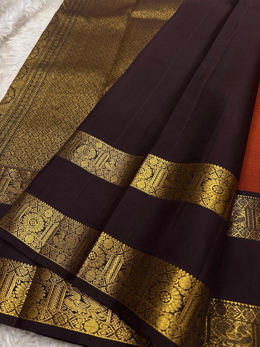Amudham — Rust Orange Pure Silk Kanchipuram
Rust-orange body with golden paisley buttas & coffee-brown zari borders ✨
Silk Mark Certified • Free Shipping USA • Ships in Two Weeks ✅