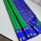 Verdant Sapphire – Pure Kanchipuram Silk Saree
Lush Green Body with Zari Kattam Checks ✨
Royal-Blue Rettapet Border with Gold Zari
Grand Royal-Blue Diamond Brocade Pallu

Silk Mark Certified, delivery in 2 weeks