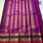 Coffee Brown Rajam – Pure Kanchipuram Silk Saree
Coffee Brown Body with Gold Zari Buttas
Rani Pink Korvai Borders with Temple, Peacock & Elephant Motifs
Grand Rani Pink Zari Brocade Pallu with Vertical Stripes & Tassels
Silk Mark | ships in two weeks