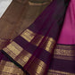 Anvitha – Magenta & Pink Shot Kanchipuram Pure Silk Saree
Glowing dual-tone silk body in radiant magenta and pink
Paired with a rich brown rettapet border featuring peacocks & floral vines in gold zari