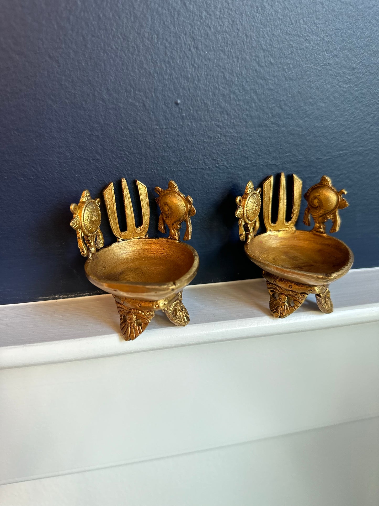 Brass shankh chakra diya (pair)