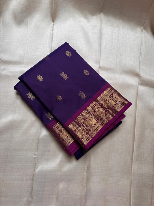 Vadamalli Mayil Chakra – Pure Korvai Kanchipuram Silk Saree
Royal purple body with gold zari paisley & medallion buttas
Contrast magenta korvai border with peacock panels; grand brocade pallu
Silk Mark Certified | Fall & Pico Done | Blouse Stitching avai