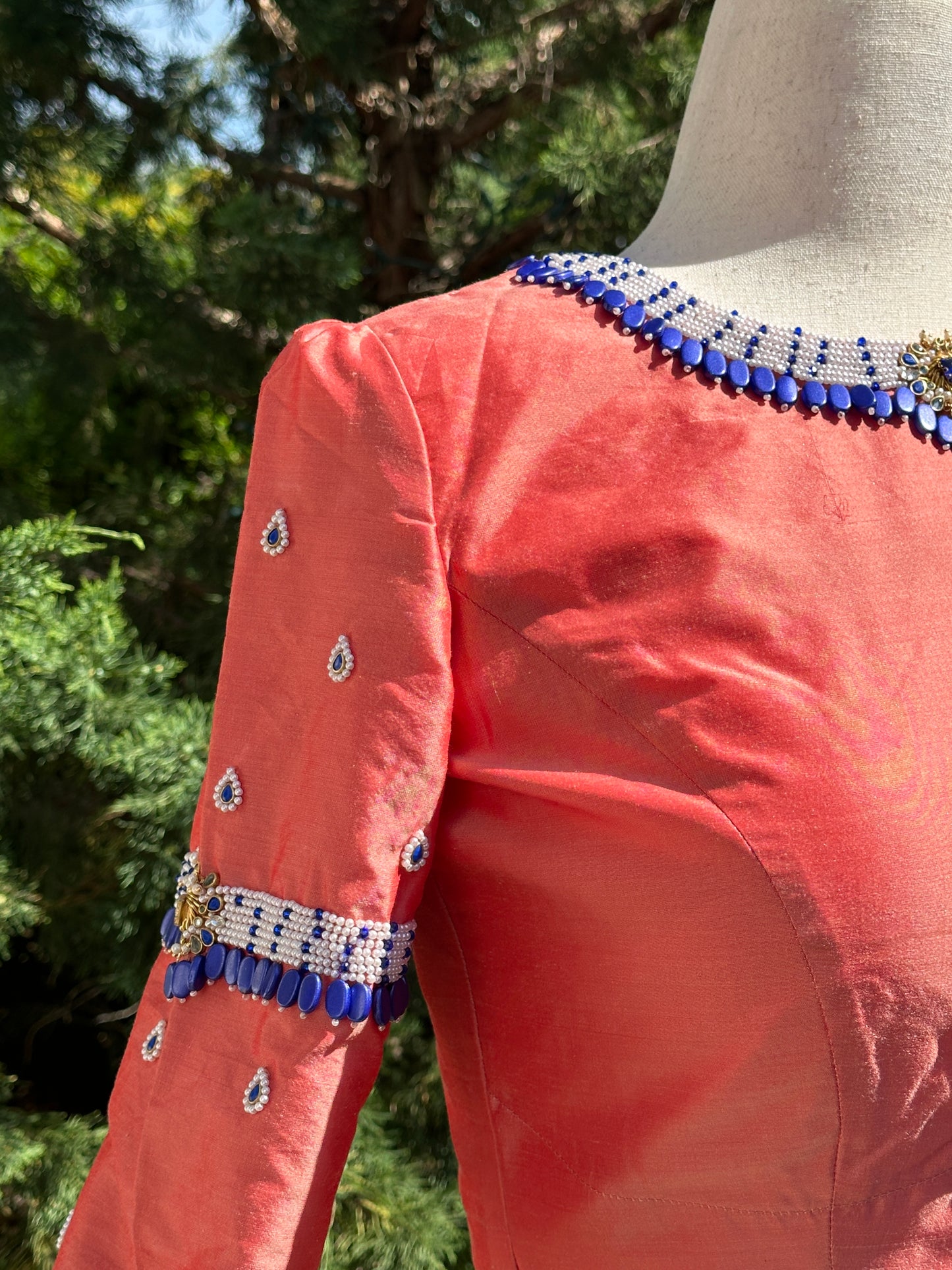 “Coral” - soft coral raw silk hand embroidered emerald beads silk blouse