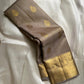 Chiku Orchard – Pure Kanchipuram Silk Saree
Elegant Chiku (Taupe) Body with Gold Paisley Buttas
Rich Antique Gold Zari Borders with Floral Motifs
Grand Gold Zari Pallu with Traditional Kattam Design
Silk Mark Certified | Ready to Ship | ships in two weeks