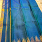 Neelam ettukol 
Pure Kanchipuram Silk Saree – Deep Ocean Blue with Silver Zari Ikat Motifs
Rich 8 Kol Weave for Heavier, Denser & Lustrous Drape
Silver Tissue Pallu with Intricate Brocade Weaving
Includes Matching Blue Blouse Piece with Zari Border