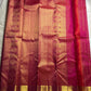 Nakshatra – Radiant pink Vairaoosi Kanchipuram Silk Saree Adorned with Mayil & Chakram Zari Buttas, Featuring an Ornate Kamalam and Floral Vine Zari Border, Flanked by Varisaipet Motifs, and a Pallu Woven with Sacred Thulasi Madams and Regal Kamalams