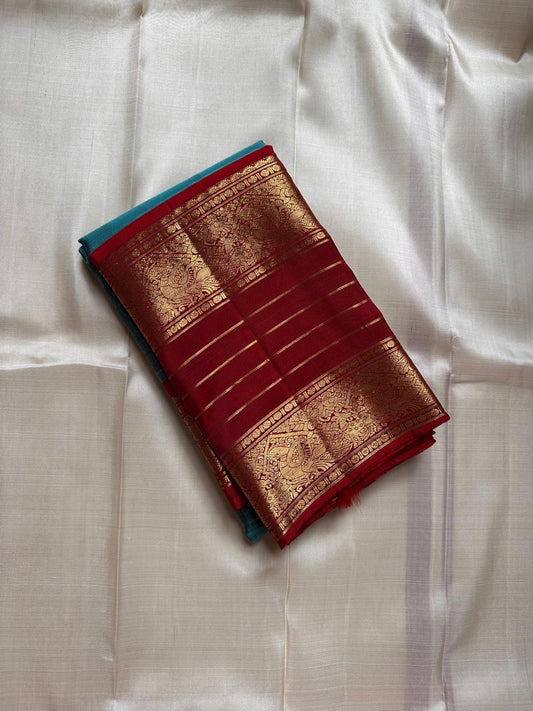 Janaki ✨
Rama Blue Pure Kanchipuram Silk Saree
With Vermilion Red Rettapet peacock Border
Gold Zari lines & beautiful Pallu
Silk Mark Certified | Handloom Heritage