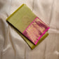 Lotus Lime Kanchipuram silk saree with lime-green body, rani pink korvai border, and grand zari brocade pallu. Silk Mark Certified. Free USA Shipping. Ships in two weeks.