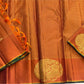 Rust Sorgavasal Mayil – Podi Kattam Pure Kanchipuram Silk Saree
Rust micro-checks with gold sorgavasal peacock chakram border
Brocade gold pallu & running blouse with border
Silk Mark Certified | Fall & Pico Done
Free Shipping (1week)
