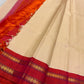 Sharvani Red– Cream Checked Silk Saree with Red Orange shot color Zari Border & Vibrant Pallu
A timeless silk saree featuring a cream body with delicate red checks, complemented by a striking red zari border pallu.