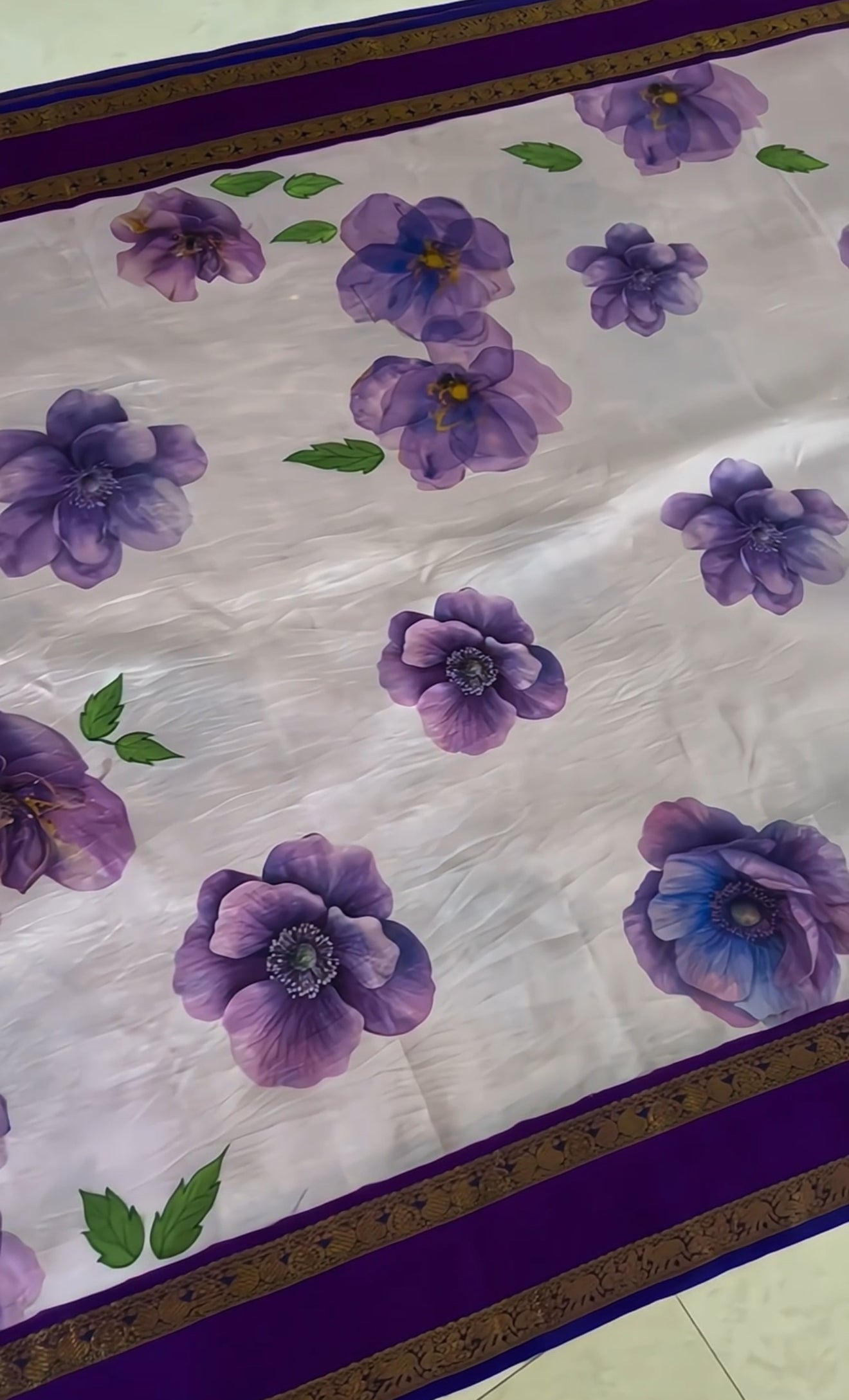 Taruni – Royal Purple Kanchipuram Silk Saree
with Digitally Printed Florals & Pure Silver Zari
A Dreamy Symphony of Silk and Botanical purple blooms