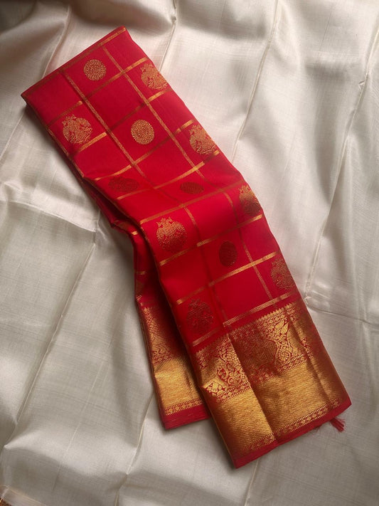 Ambaram – Sindhuram - Silk mark certified Kanchipuram silk

Elephant Procession Zari Border • Coin & Gandaberunda Buttas

Copper-Orange Brocade Pallu with Diamond-Jaal

Handloom • Running Red Blouse with Zari Border

Silk Mark Certified • Ships in Two Wee