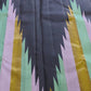 Rich black Ettukol Kanjivaram silk showing the contrast between deep charcoal and soft pastel woven accents.