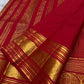 Vermilion Podi Kattam 🌺 Pure Silk Kanchipuram Saree

All-over zari pinstripes & mini podi kattam checks ✨

Broad antique-gold borders with chakram medallions 🪙

Silk Mark Certified ✅ | F
