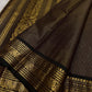 Kohl Swarna — silk mark certified lightweight saree 
Deep kohl brown body with fine pinstripes and gold rosette buttas, framed by antique-gold zari borders and grand paisley brocade pallu• free shipping eithin usa  two weeks