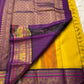 Kili Manjari — Pure Silk Kanchipuram
Haldi Yellow • Parrot & Coin silk thread Buttas • Plum Zari Border
Silk Mark Certified ✅ Free  Shipping ✅ Ships in 1 week ✅