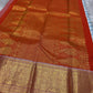 A saree where sky blue melts into sunrise orange—pure silk Kanchipuram magic.