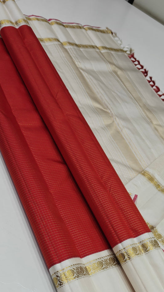 ✨ Swathi Shubram — Pure Kanchipuram Silk Saree
Vermillion red body with oosi-kattam pin checks, paired with ivory-gold borders and rose-pink selvedge
Silk Mark Certified • Free Shipping within USA • Ships in Two Weeks •