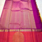 Mangai Manjal Chakram — Kanchipuram Pure Silk

Sun-yellow body with tiny zari buttas • Korvai contrast border

Rani-pink shot with purple selvedge • chakram medallions

Vaira-oosi diamond pallu with dual-tone tassels

Silk Mark Certified • Free shipping