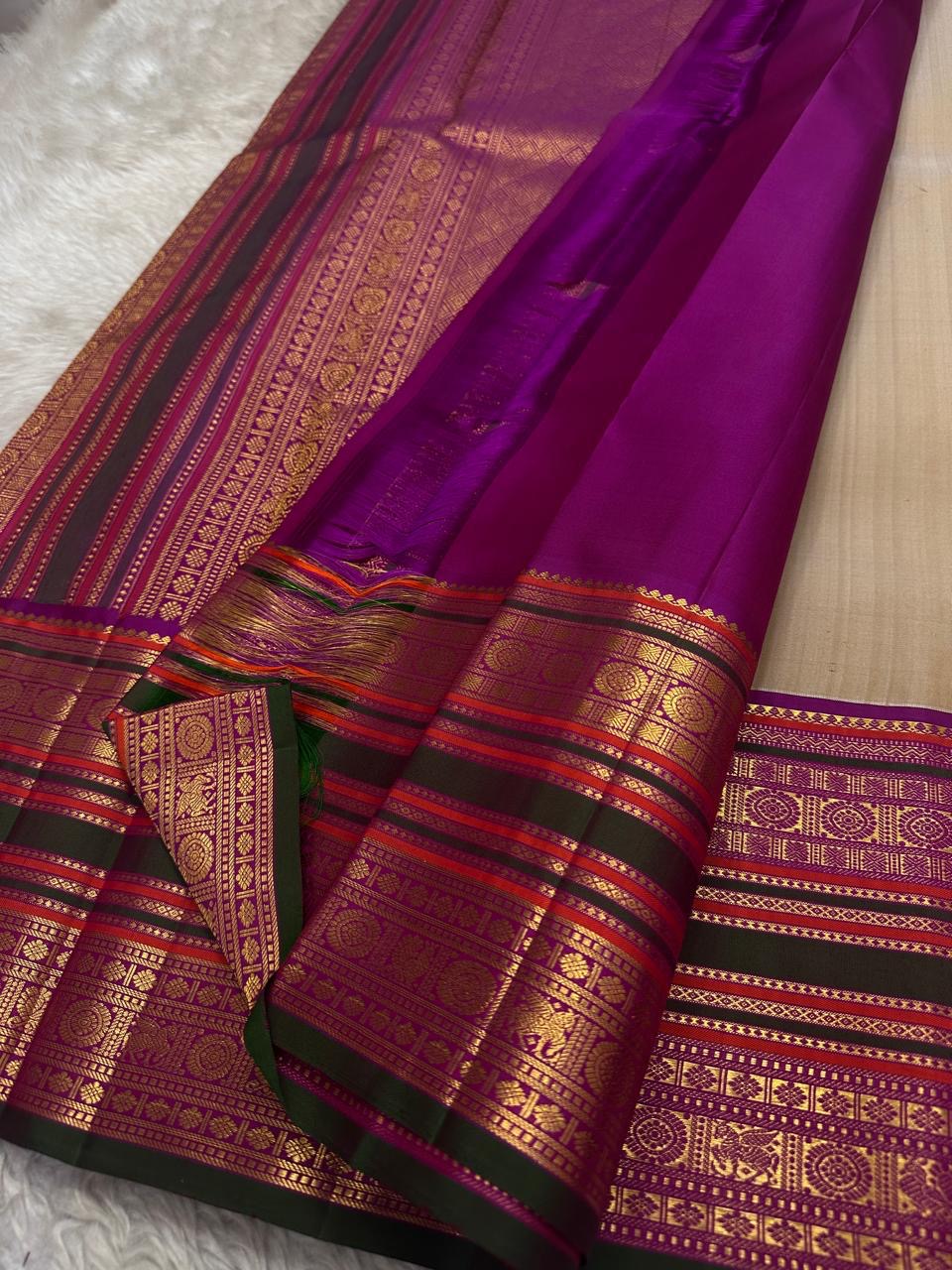 Mridula — Soft Biscuit Brown Kanchipuram Silk Saree
Biscuit-gold body with coin buttas, rani-green rettai pettu border & royal-purple brocade pallu
Silk Mark Certified ✅ • Ships in 1 Week • Free USA Shipping 🇺🇸blouse stitching available