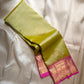 Lotus Lime Kanchipuram silk saree with lime-green body, rani pink korvai border, and grand zari brocade pallu. Silk Mark Certified. Free USA Shipping. Ships in two weeks.