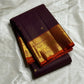 Deep Plum Orange
A regal dance of plum and burnt orange
Micro-checks kissed with golden buttas
Elephant borders marching in heritage grandeur
Brocade pallu glowing in timeless zari brilliance

Silk Mark Certified, delivery in 2 weeks